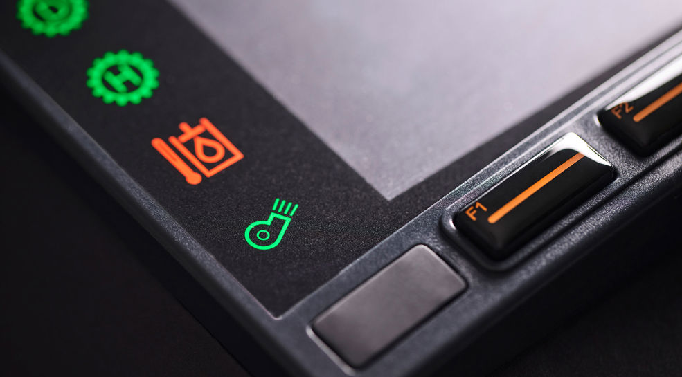 Cover glass HMI solution with deadfront effect, and backlit status symbols