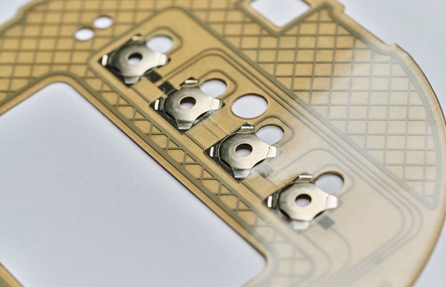 Metal domes give clear tactile feedback in keypads.