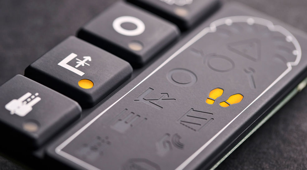 Silicone rubber keypad for forlift trucks with LED status light. Backlight is essential for safe operation of a rubber keypad in dark environments. 
